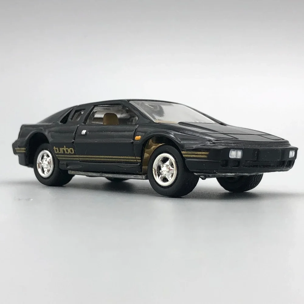 Johnny Lightning 1977 Lotus Esprit Turbo S1 Diecast Car Black Diecast 1/64 Scale